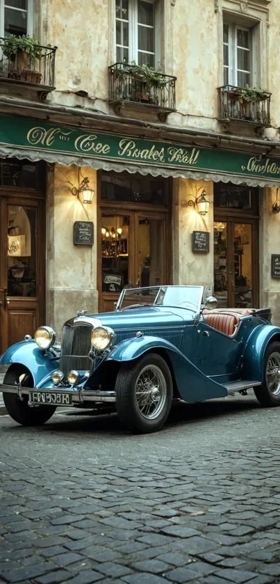 Vintage blue car parked in Parisian street with cobblestone road.