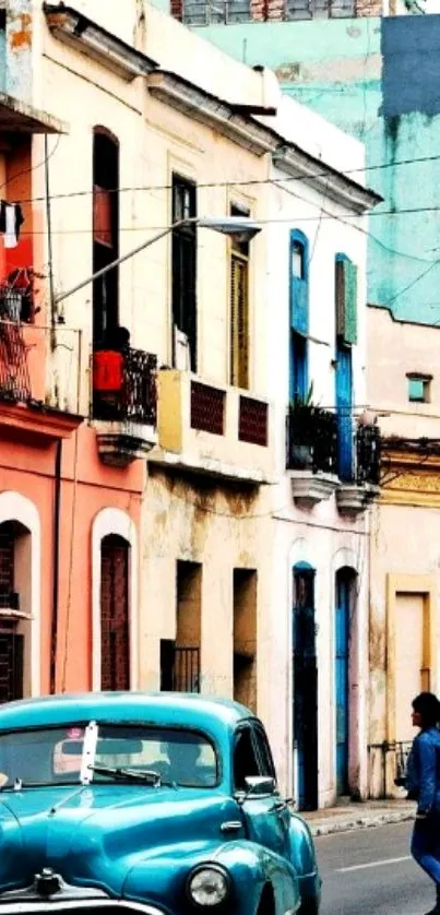 Vintage car in colorful street with historic buildings.