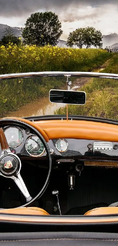 Vintage car interior against a lush green landscape with scenic views.