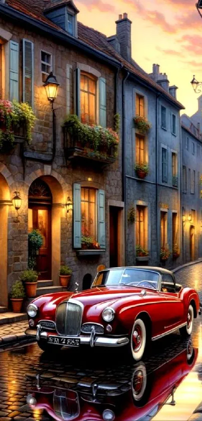 Red classic car on cobblestone street at sunset.