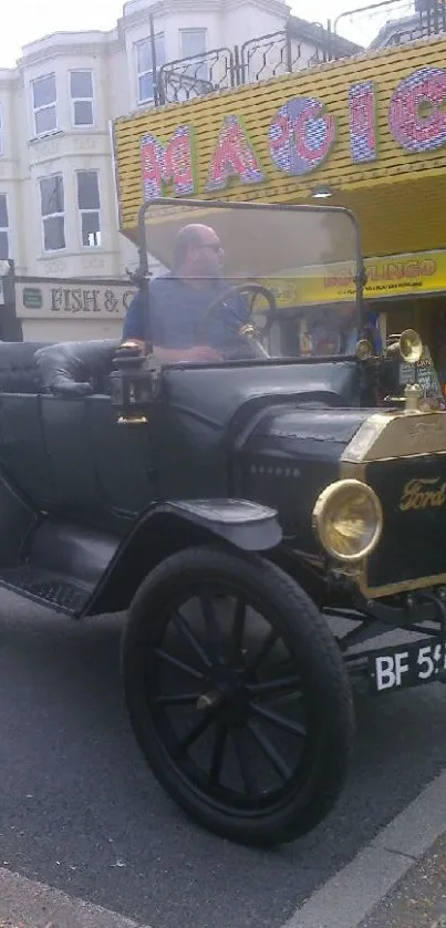 Vintage Ford car driving on a busy street.