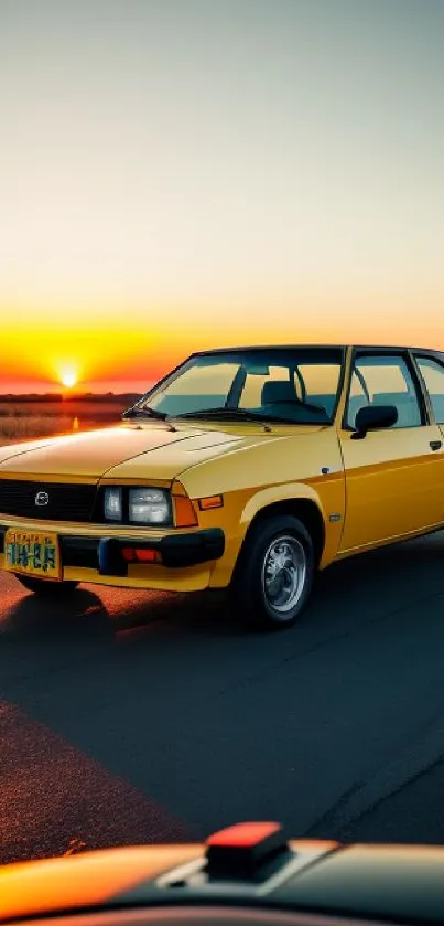 Yellow vintage car driving at sunset on an open road.