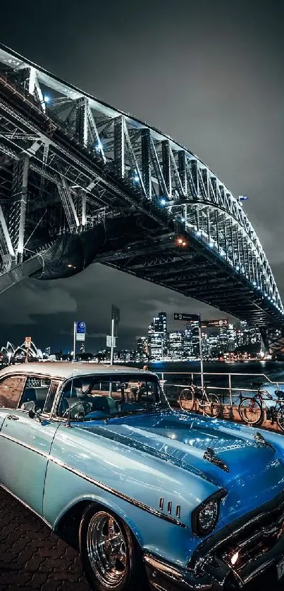 Vintage car beneath illuminated city bridge at night.