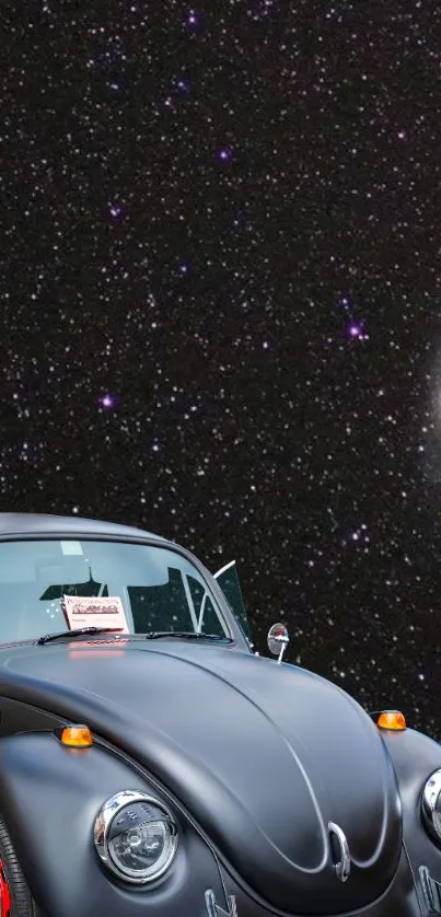 Vintage black car with starry sky background in mobile wallpaper.