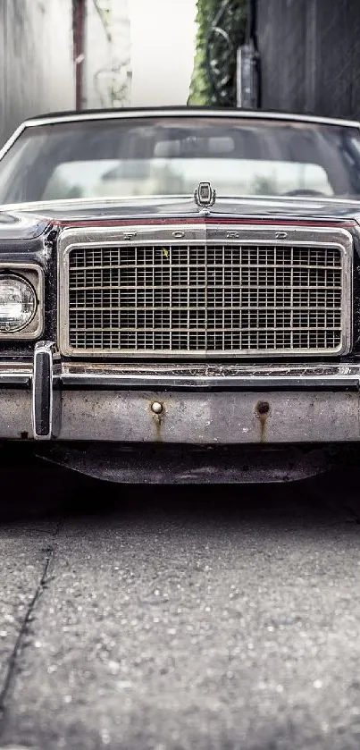 Classic vintage car parked in a narrow, dark alleyway.