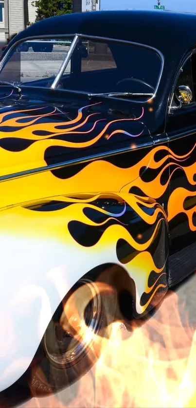 Vintage car with vibrant flames on the side.