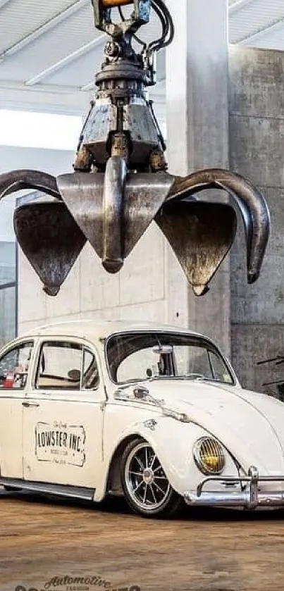 Vintage Volkswagen Beetle under industrial claw in a garage setting.