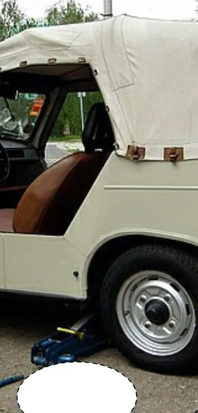 Vintage car with white canopy in a detailed wallpaper view.