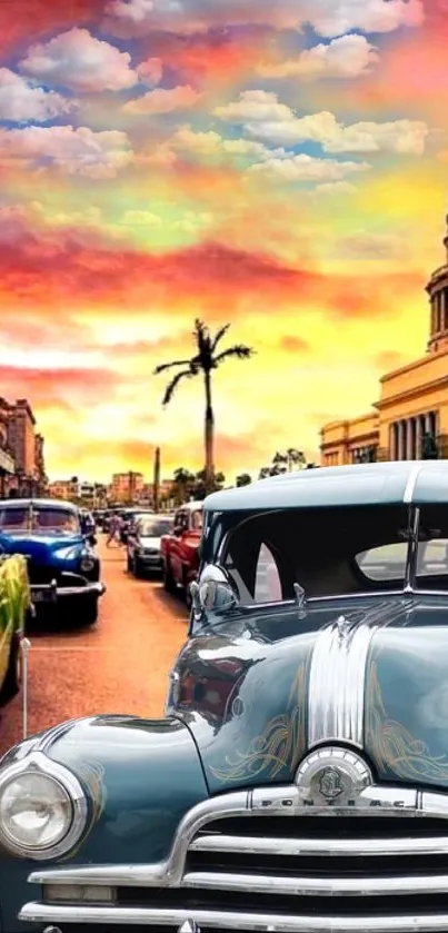 Vintage cars in Havana against a vivid sunset sky.