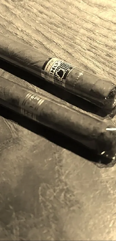 Elegant vintage cigars on wooden surface in sepia tone.