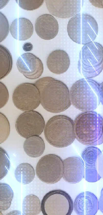 A collection of vintage coins on beige wallpaper.