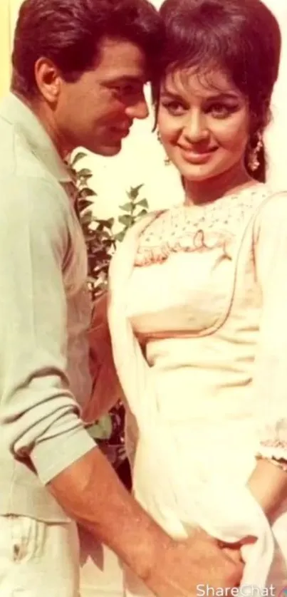 Vintage photo of a romantic couple in elegant attire.