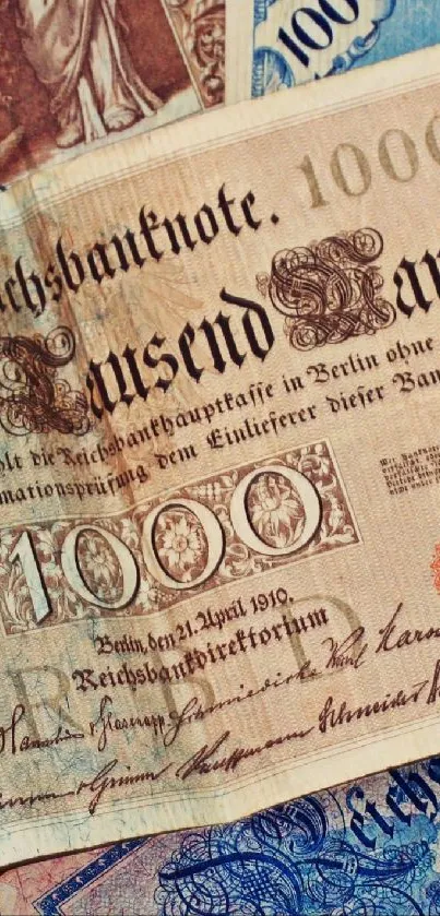 A collection of vintage currency banknotes in brown and blue shades.