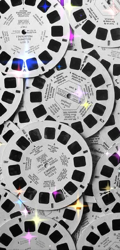 Collage of vintage black and white film reels, creating a retro aesthetic.