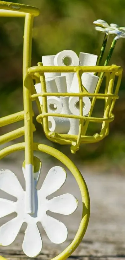 Vintage bicycle with floral design in yellow and white.