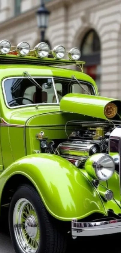 Lime green vintage car in urban setting with classic design.