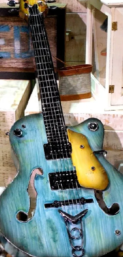 Vintage artistic guitar with turquoise finish.
