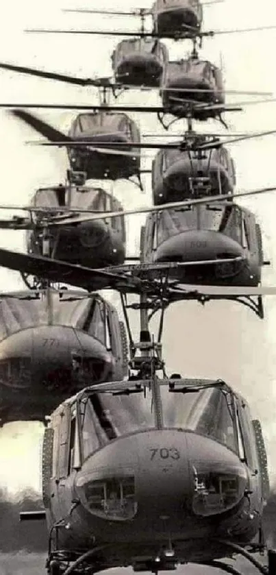 Black and white vintage helicopters flying in formation.