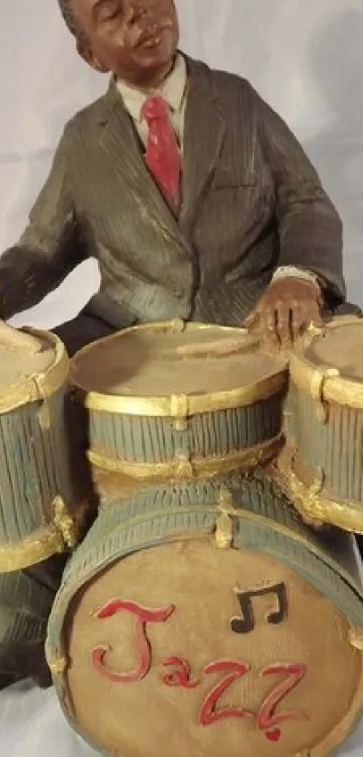 Vintage sculpture of a jazz drummer with brown suit.