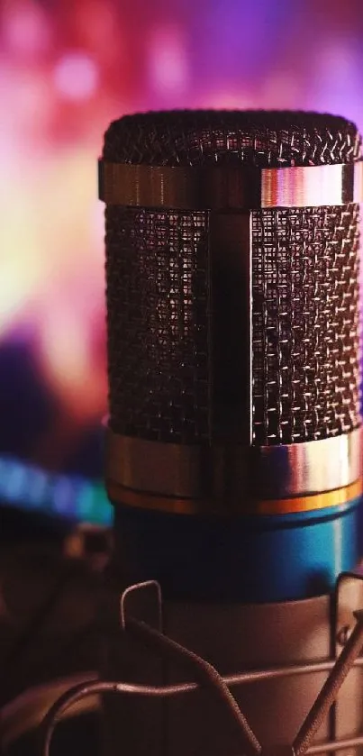 Vintage microphone with colorful blurred background.