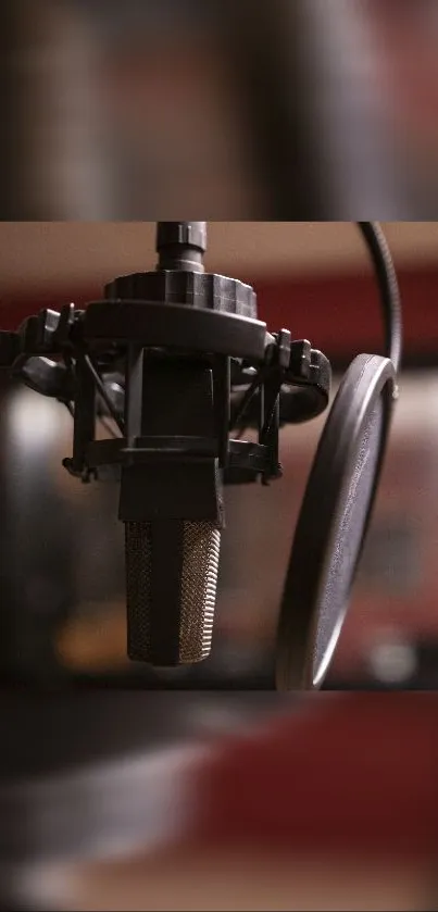 Vintage microphone in music studio setting wallpaper.