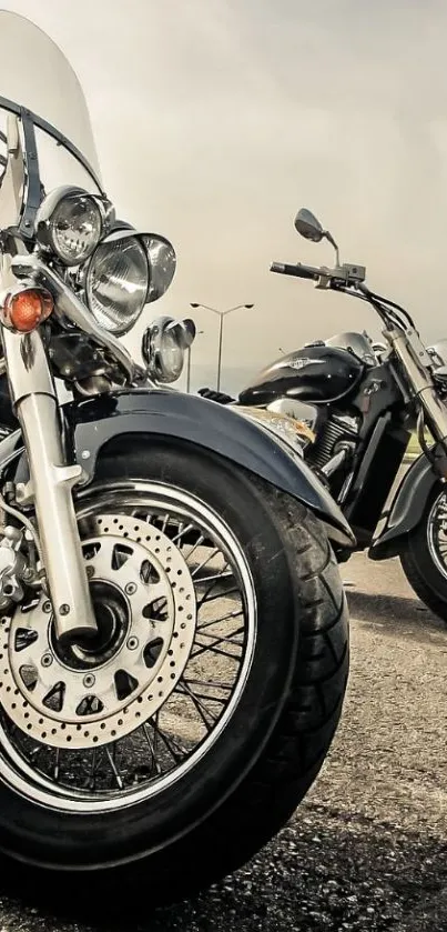 Two vintage motorcycles on a road, ready for an adventure.