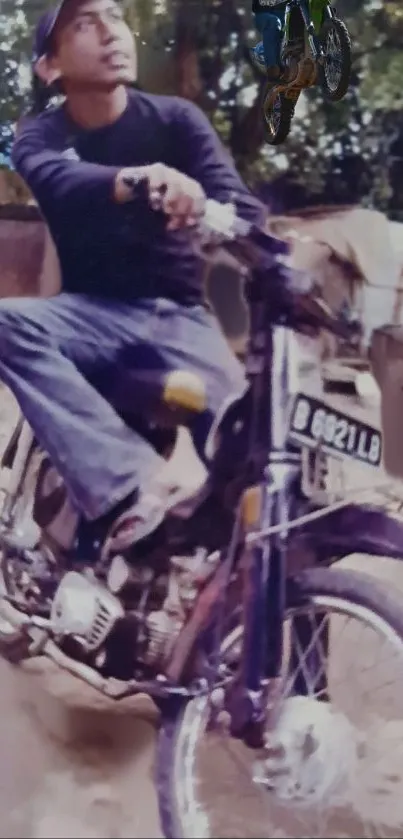 Person on vintage motorcycle in rustic setting.