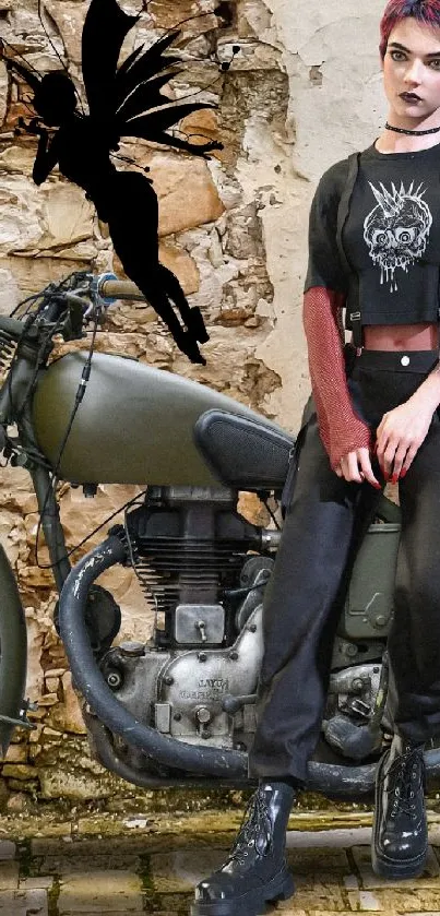 Person with fairy wings sits on vintage motorcycle against brick wall.