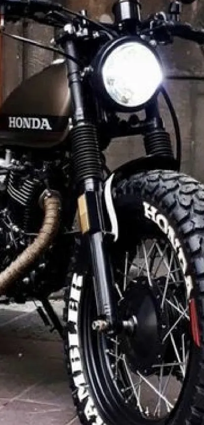 Vintage Honda motorcycle with bold tires.