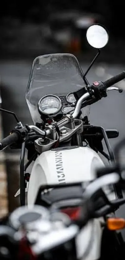 Vintage motorcycle focus with road background.