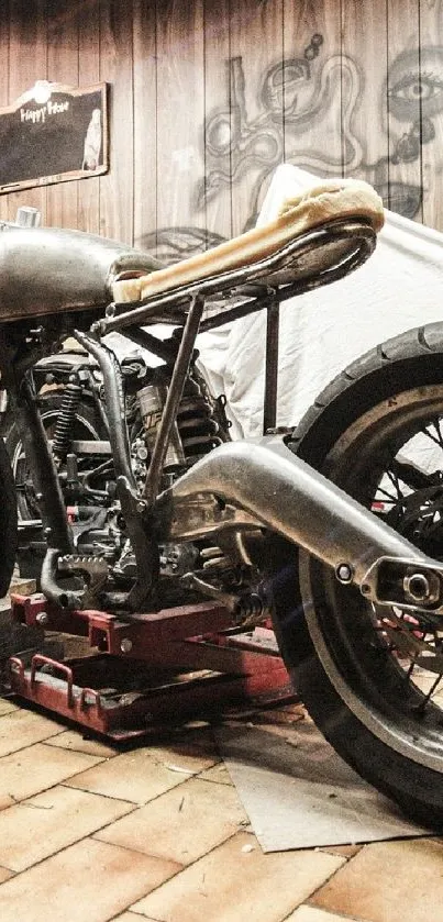 Vintage motorcycle in a workshop setting, showcasing classic design and craftsmanship.