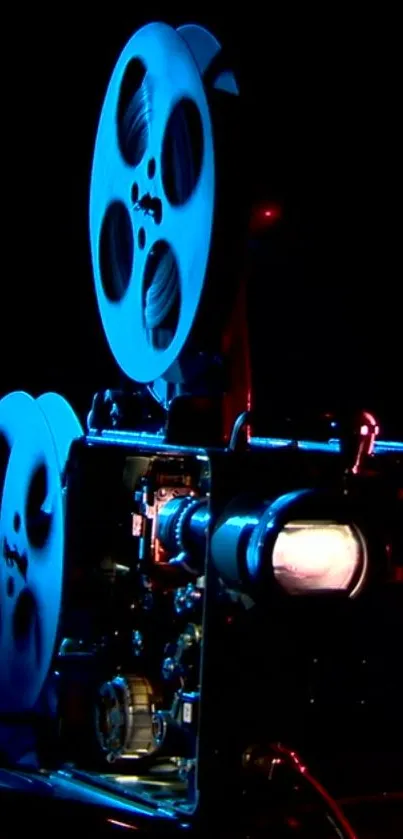 Vintage film projector in neon blue tones on black background.