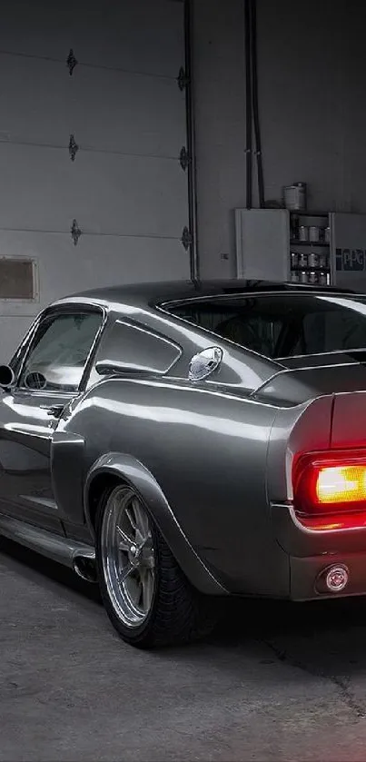 Vintage Mustang parked in a dimly lit garage with red taillights glowing.