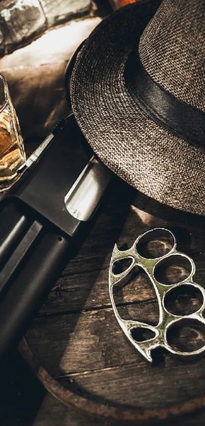 Vintage noir style wallpaper with a hat, shotgun, and brass knuckles.