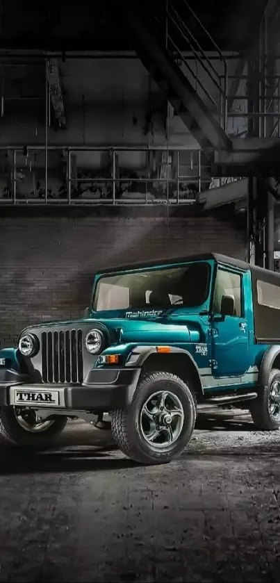 Vintage teal Jeep in industrial setting mobile wallpaper.