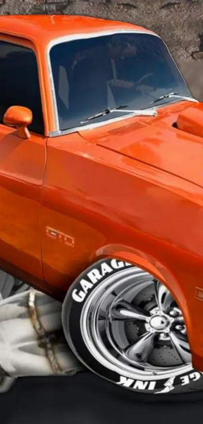 Orange vintage muscle car with chrome wheels and a classic design.