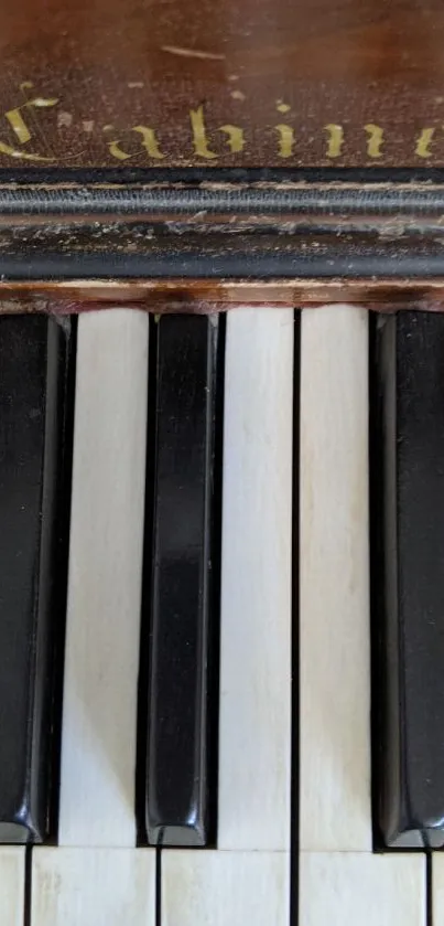 Vintage piano keys with rustic charm and elegant design in dark brown hues.