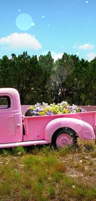 Vintage pink truck with flowers in nature.