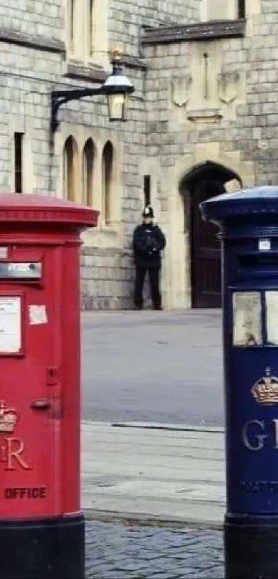 Red and blue postboxes with historical building background.