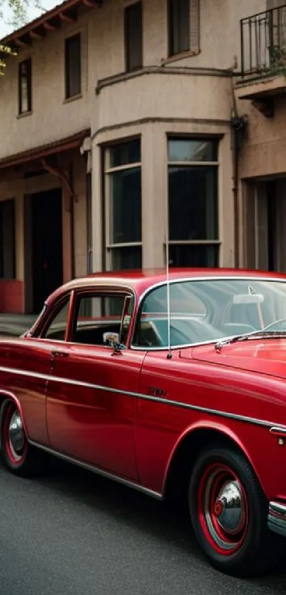 Classic red vintage car parked on city street.