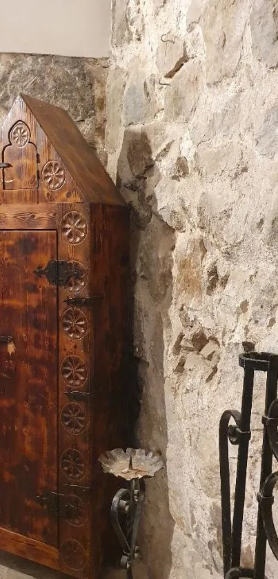 Rustic wooden cabinet against textured stone wall backdrop.