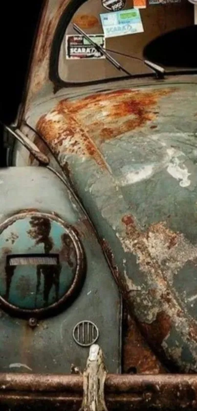 Close-up of a vintage rusty car with weathered paint.