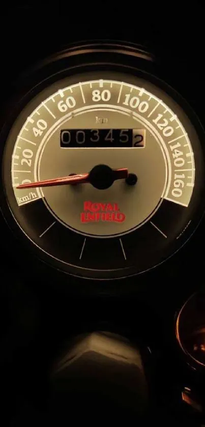 Mobile wallpaper of a vintage motorcycle speedometer with a black background.