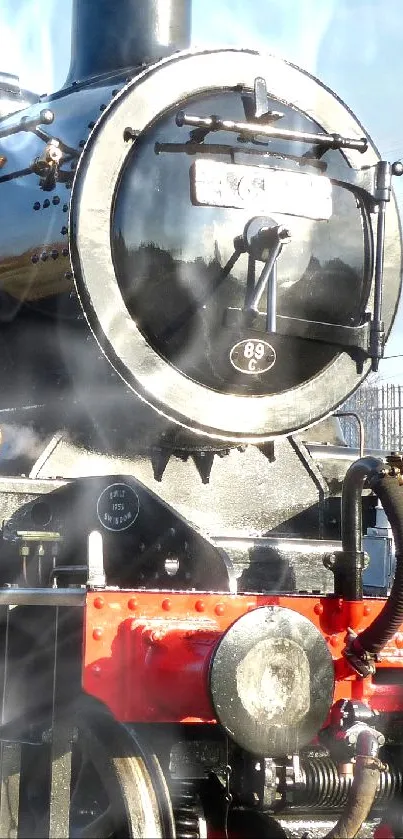 Close-up of a classic black steam train.