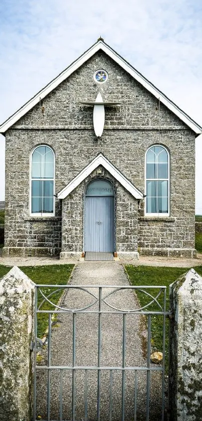 Vintage stone church against clear sky.