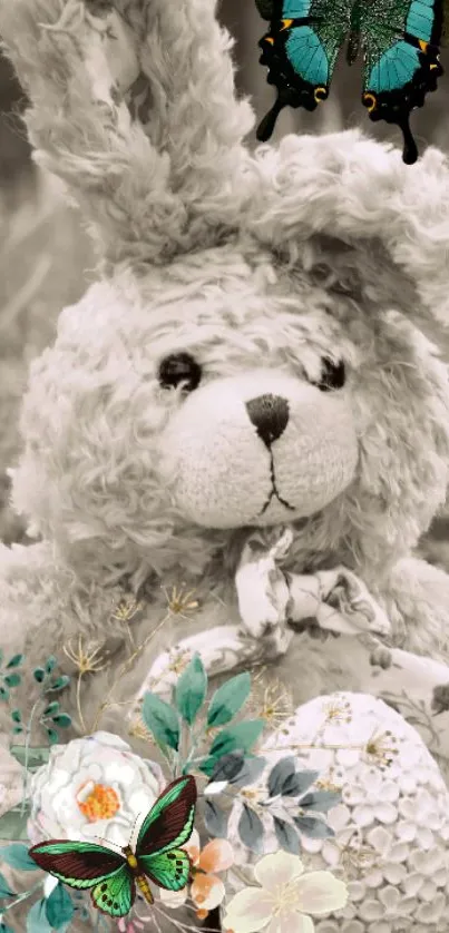 Vintage teddy bear with butterflies in a floral setting.