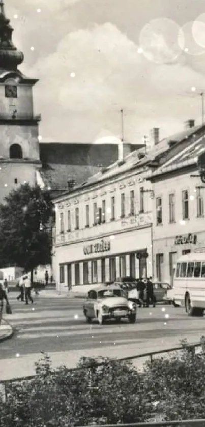 Monochrome vintage townscape with buildings and a clock tower.