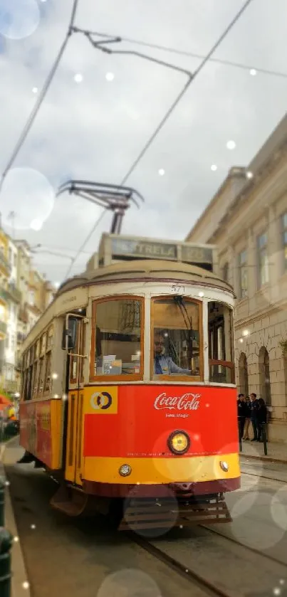 Vintage yellow tram on a Lisbon street with urban architecture backdrop.