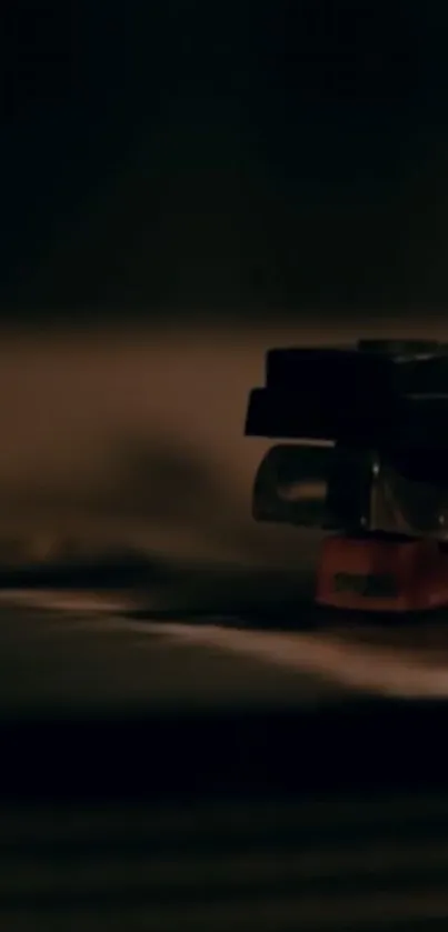 Close-up of a vintage turntable and vinyl, dark aesthetic.