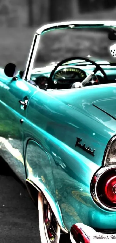 Vintage turquoise convertible car wallpaper with a classic retro look.